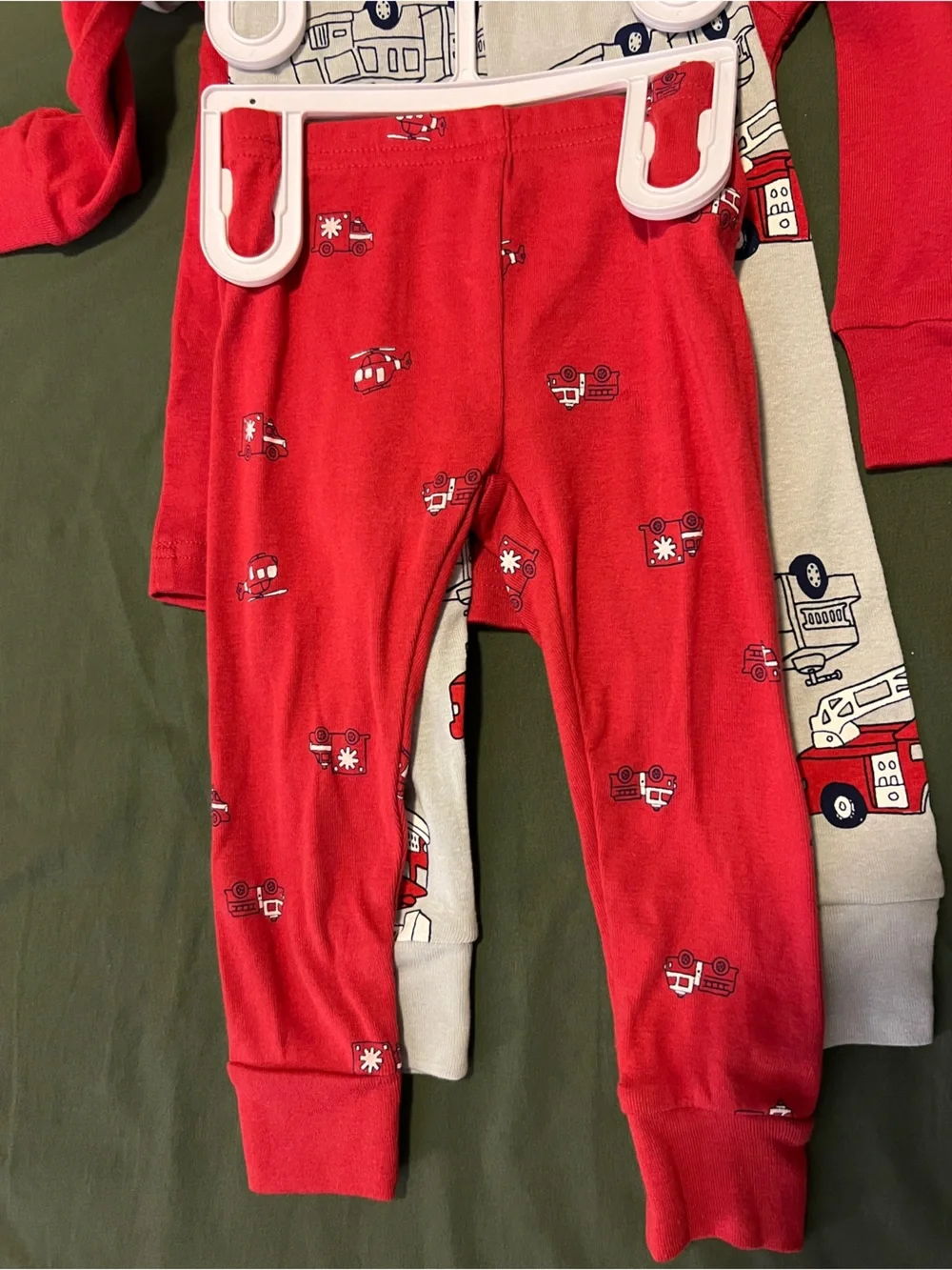 Two Pairs of Carter's Red and Gray Fire Truck Pajama Sets Size 12M.